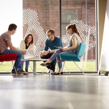 Group Discussion around coffee table.